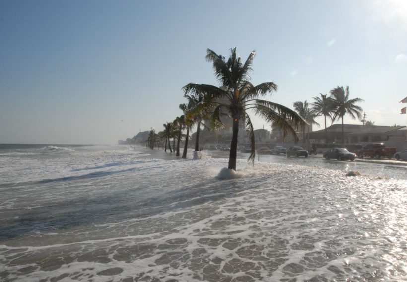 Photo of water overflowing shore depicting rising sea levels, from Dave/Flickr/Creative Commons/CC BY 2.0, via NASA.gov.