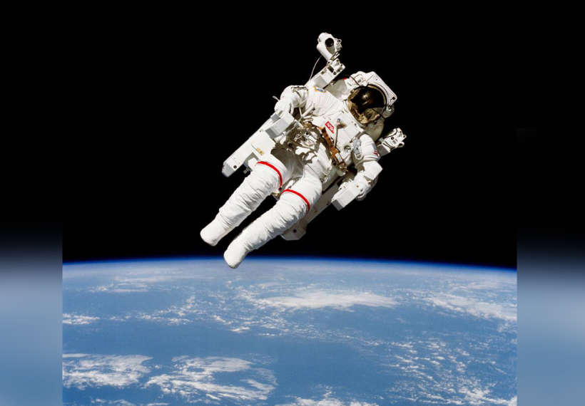 NASA's image of astronaut Bruce McCandless II on a spacewalk a few meters away from the cabin of the space shuttle Challenger on Feb. 7, 1984.