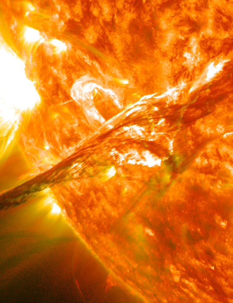 Filament of solar material from Sun erupting into space as a coronal mass ejection, traveling at over 900 miles per second.