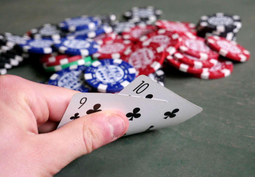 Santeri Viinamäki’s photo of two poker cards and poker chips.