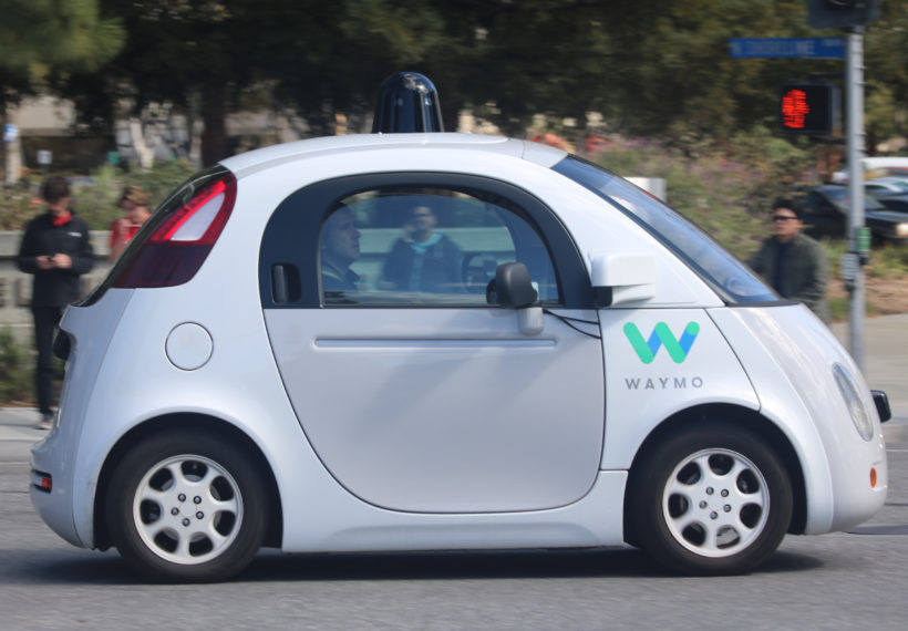 Grendelkhan’s image of a Waymo self-driving car on the road in Mountain View, making a left turn. (Side view.)