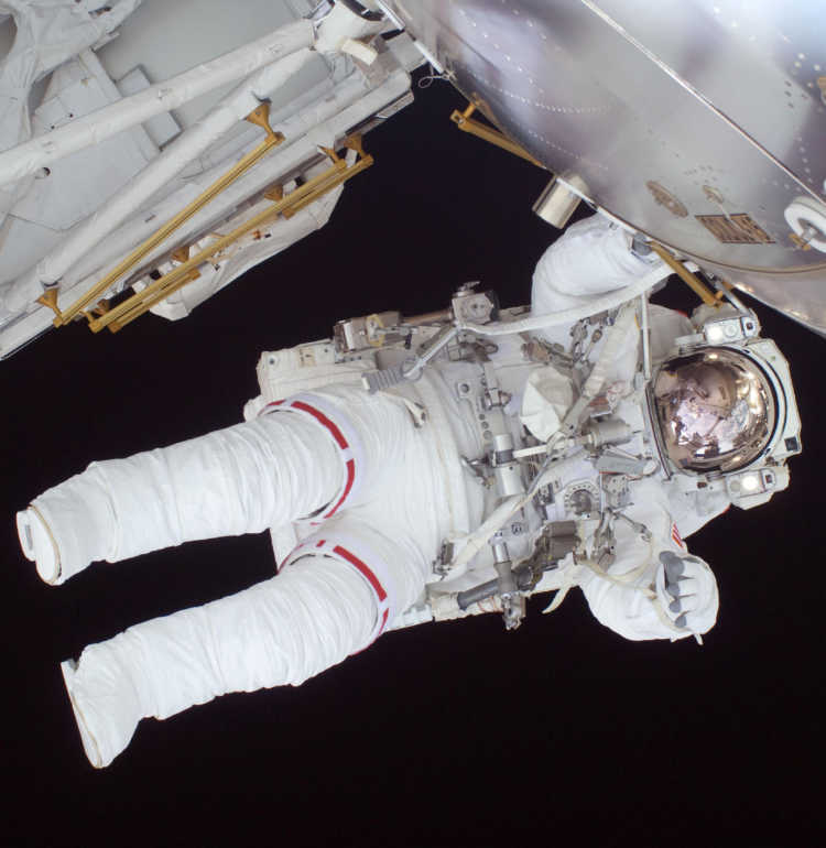Expedition 20 flight engineer Nicole Stott participates in the STS-128 mission's first spacewalk as construction and maintenance continue on the International Space Station.