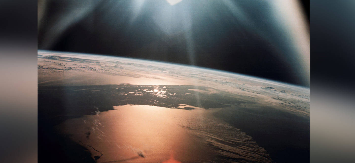 The morning sun reflects on the Gulf of Mexico and the Atlantic Ocean as seen from the Apollo 7 spacecraft during its 134th revolution of the Earth on Oct. 20, 1968.