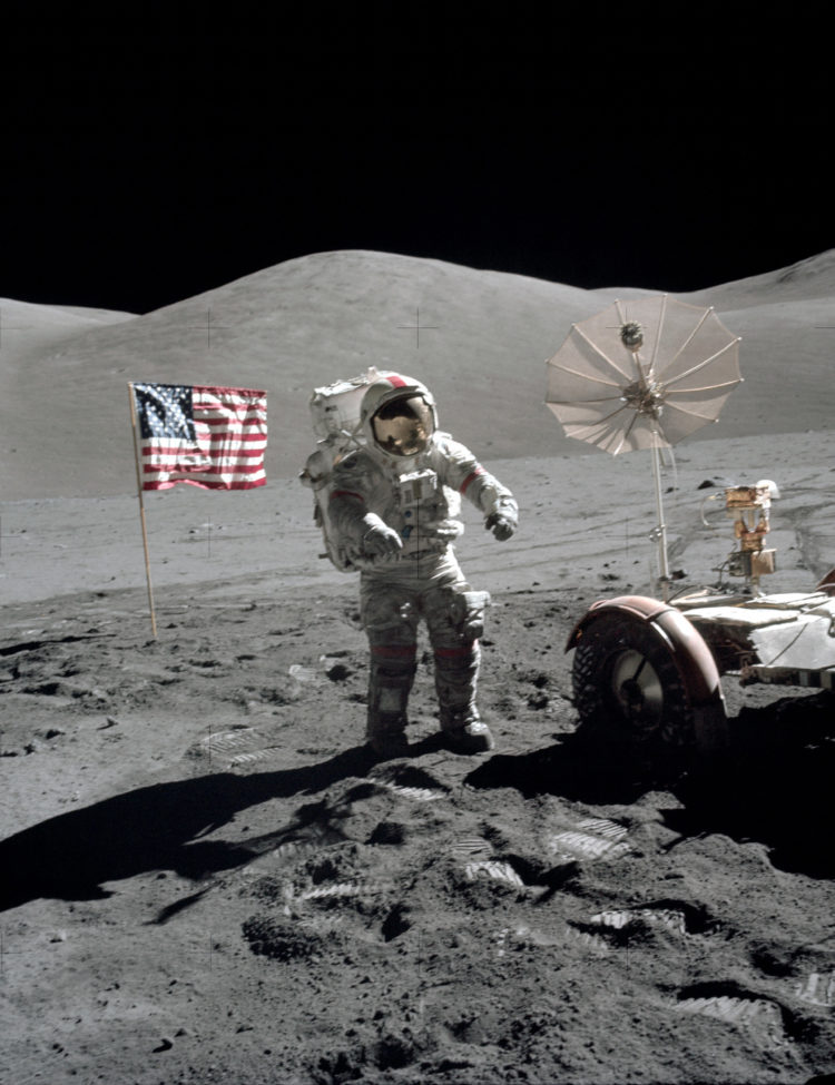 Astronaut Eugene A. Cernan, mission commander, walks toward the Lunar Roving Vehicle (LRV) at the start of the third extravehicular activity (EVA-3) at the Taurus-Littrow landing site of NASA's sixth and final Apollo lunar landing mission.