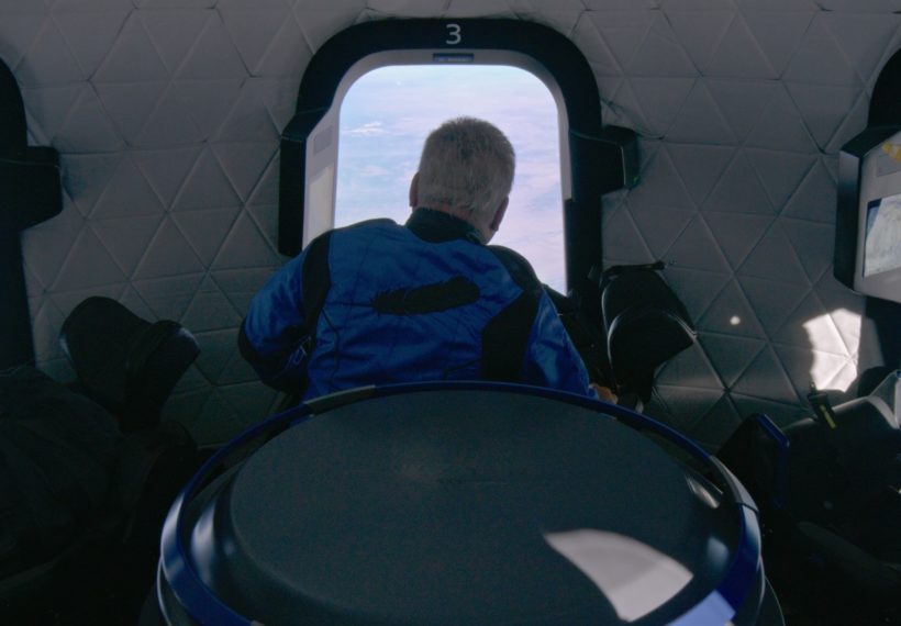 William Shatner looks out of the New Shepard windows on NS-18. (October 13, 2021)